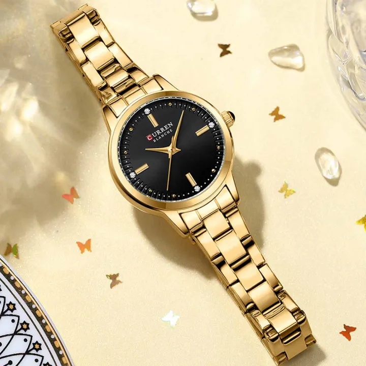 Sleek, polished gold-tone stainless steel women's watch - Image 3